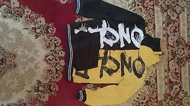 məktəb yubkası (məktəb ətəyi): Uşaq geyimləri dəsti - Tünd göy rəngli, V-yaxa sviter jilet. Yaxası — 10