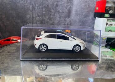 maşın modeli: Коллекционная модель Hyundai i30 5 door white 2012 Pino B&D Scale — 8