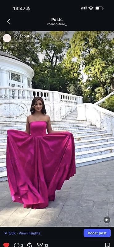 ağ don modelləri: Parlaq fuksiya rəngində, uzun və həcimli ətəkli axşam geyimi. Model — 2