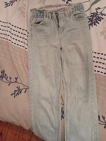 cins şalvar modelleri: Açıq mavi rəngli cins şalvar. - Klassik beş ciblidir: iki ön cib, bir — 1