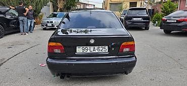 a class mercedes: BMW 5 series: 2.5 l | 1999 il Sedan — 3