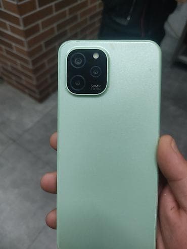 p smart ekran: Məhsul: 50MP AI kameraya malik yaşıl rəngli smartfon Xüsusiyyətlər: - — 1
