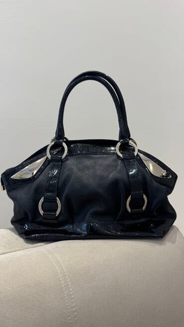 Fabrizio Poker firması olan qara rəngli qadın əl çantası. Çanta həm