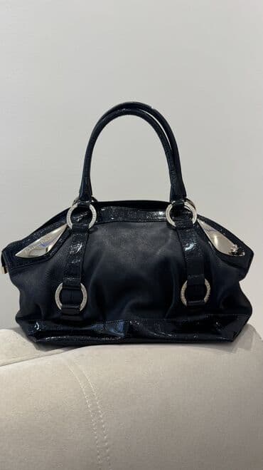 силиконовый бюстгальтер пуш ап: Fabrizio Poker firması olan qara rəngli qadın əl çantası. Çanta həm — 1