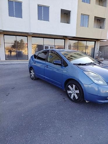 ford ehtiyat hisseleri: Toyota Prius (2-ci nəsil) hibrid hetçbek - Rəng: mavi - Salon: boz — 6