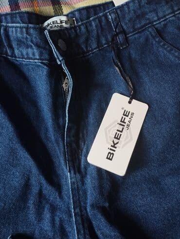 qadınlar üçün qısa cinslər: Yeni qadın şalvarları. Öndə, arxada və yanlarda M ciblər Etiketi ilə — 2