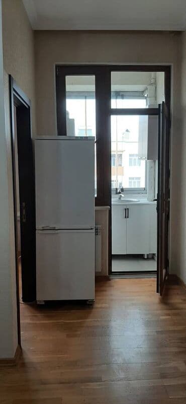 qarayev obyekt: Qaraev metrosuna yaxin 18 mertebeli binanın 16-ci mərtəbəsində — 15