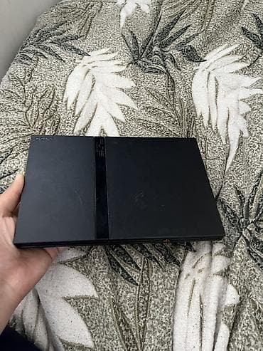 PlayStation 2 Slim (SCPH seriyası) oyun konsolu Xüsusiyyətlər: - — 2