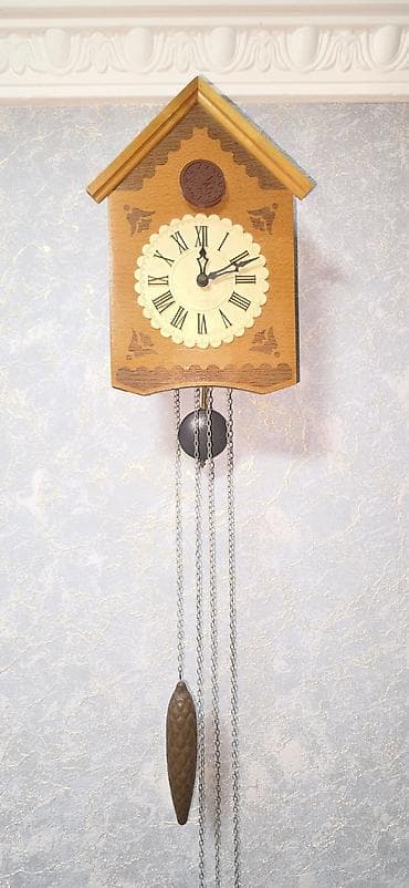 Divar saatları, Mexaniki, Ququ quşlu