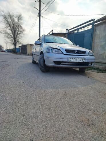 xanımlar ucun maşınlar: Opel Astra: 1.6 l | 1998 il Universal — 9