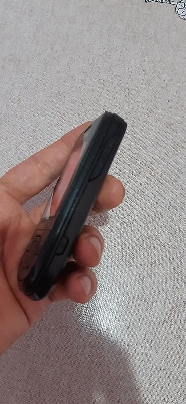 Техника и электроника: Nokia 1, цвет - Черный, Кнопочный — 3