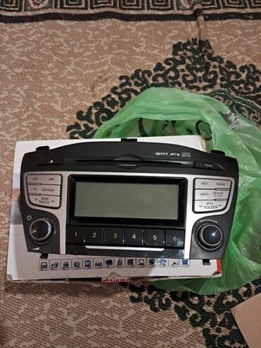 Avtomobil üçün orijinal inteqrasiya olunan audio başlıq (head unit)