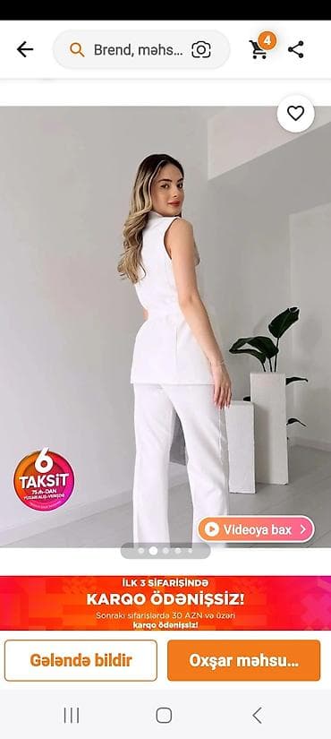 klassik qadın şalvarları: Ağ rəngli qadın dəst – qolsuz jilet və düz kəsimli şalvardan ibarət — 1