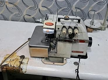 Бытовая техника: Швейная машина Gemsy, Б/у,Оверлок, 3-нитка — 1