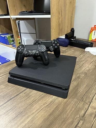 PlayStation 4 Slim oyun konsolu + 2 ədəd orjinal DualShock 4 pultu +
