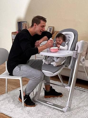 Kidilo Brendindən elektrik özü yellənən yemək masası. Həm Yemək masası