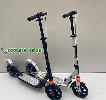 moto debilqe: Şəhər içi rahat hərəkət üçün böyük təkərli skuterləri. Çatırlma — 1