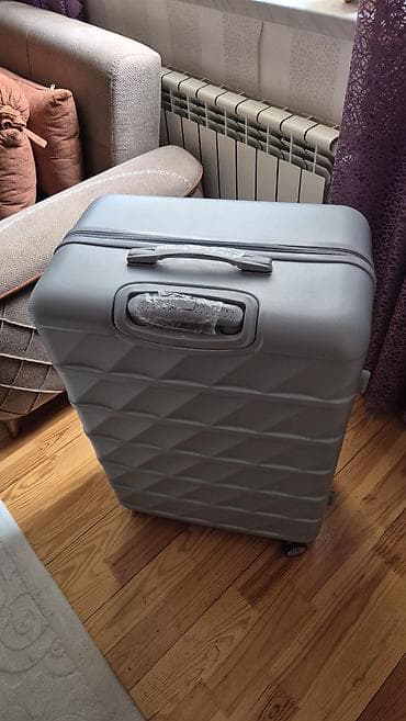 Çamadanlar: *Heç istifadə olunmamış* Böyük tutumlu (~120L), yeni çamadan — 1