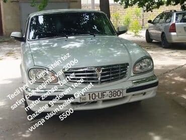 kridit maşınlar: Ağ rəngli QAZ Volqa markalı sedan avtomobili. Avtomobil geniş salonu — 6