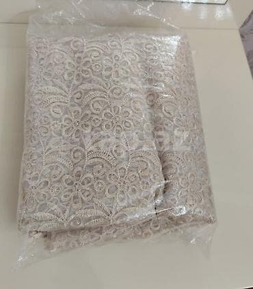 ütü alti: Zərif naxışlı krujeva parçadır. - Material: sıx toxunuşlu krujeva — 1