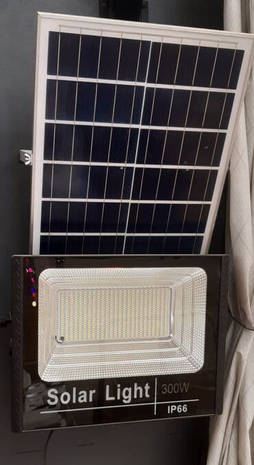 lovhə: Günəş enerjili LED proyektor lampalar Məhsulun xüsusiyyətləri: - Güc — 5