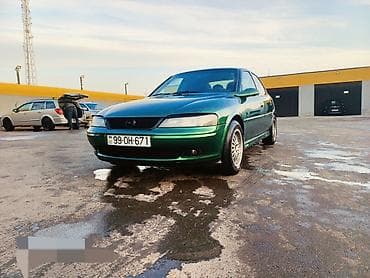 samara maşın: Opel Vectra sedan – yaşıl rəng, 4 qapı, AZ nömrə nişanı. Şəhərdaxili — 9