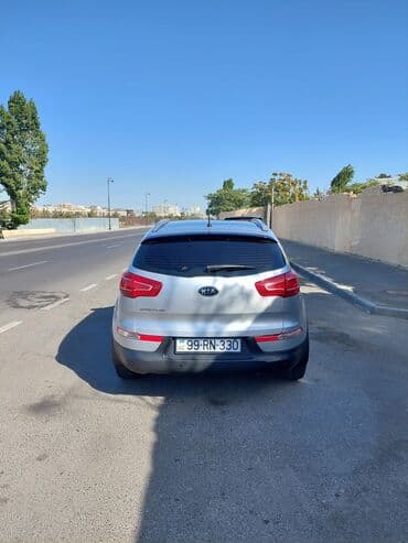 hediye qutusu: Kia Sportage: 2 l | 2012 il Universal — 2