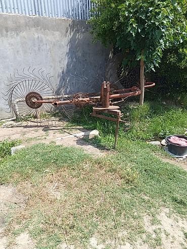 Traktor üçün ot yığan/çarpan “günəbaxan” tipli tırmık (barmaqlı