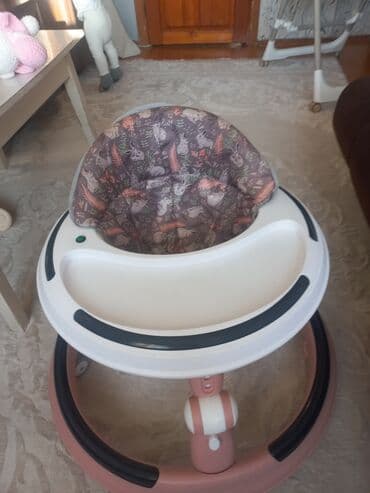 Uşaq gəzdirəni / yerişi öyrədici “walker” - Dairəvi baza: sabitlik və