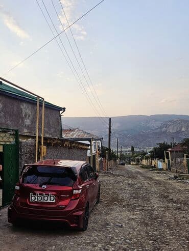 rustavi masin bazari: 1.2 turbo matorTünd qırmızı rəngdə Nissan Note Hetçbek avtomobili, həm — 4