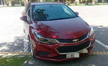 yağış sensoru: Chevrolet Cruze sedan – qırmızı (metalik) rəngdə, 4 qapı, arxa “CRUZE” — 1