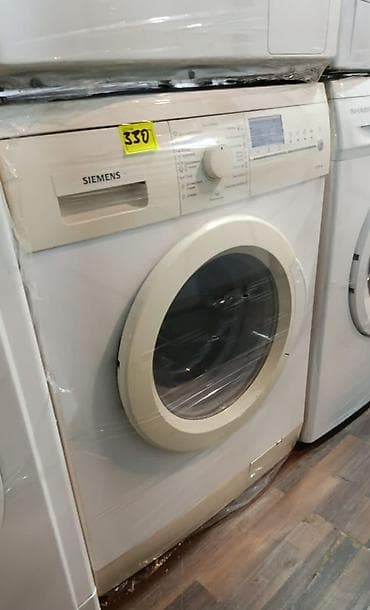 elektro kamin: Siemens ön yükləməli paltaryuyan maşın - Ön paneldə tam mexaniki — 1