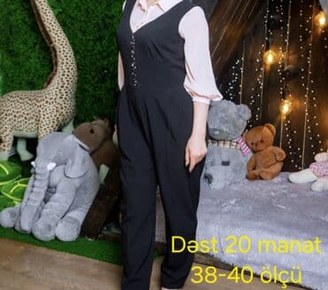 Костюмы: Yer çatışmazlığına görə satılır Qadın geyim dəsti: qara kombinezon və — 1