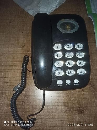 Stasionar telefon Simli