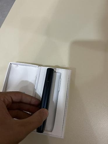 nişan şalları: IQOS cihazı – tünd mavi rəng Xüsusiyyətlər: - Kompakt, zərif dizayn; — 2