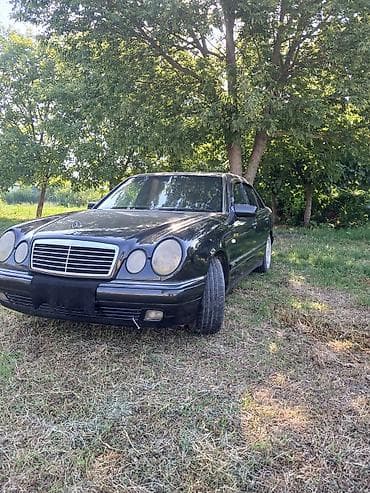 Mercedes-Benz E 320: 2.3 л | 1996 г. Седан