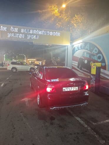 телефон держатель для автомобиля: Chevrolet Aveo: 1.4 л | 2010 г. 200 км Седан — 5