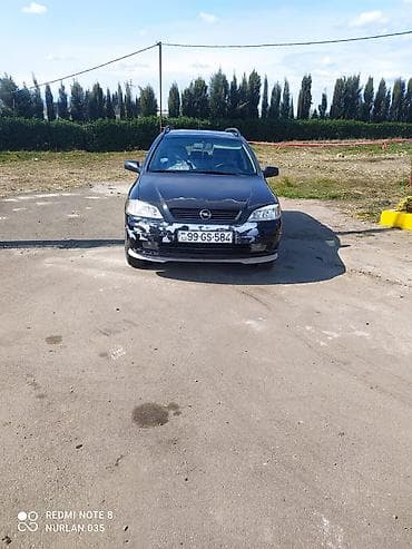 Opel Astra: 2 l | Universal