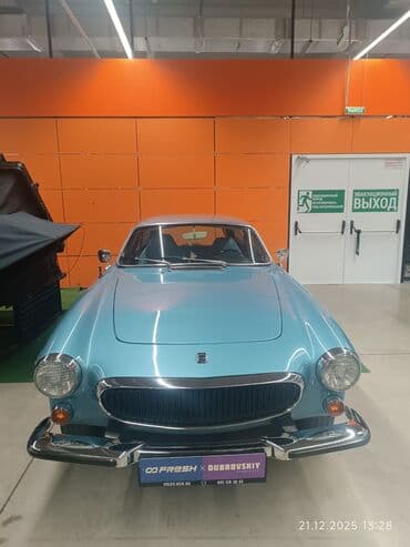 tek oturacaqlar: Klassik kupе avtomobil – Volvo P1800 (göy rəng). Xüsusiyyətlər: - — 1