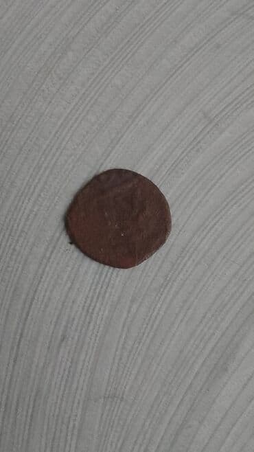 CD, DVD disklər və kassetlər: Məhsul: Köhnə mis sikkə (4 ədəd) Təsvir: - Material: mis - Say: 4 — 6