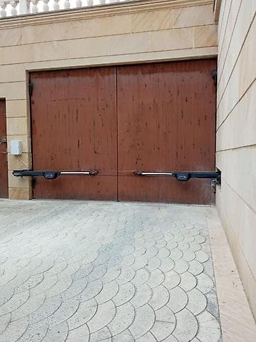 Qapı ustası xidmətləri: Doqqaz Avtomatik qapi qollari Azerbaycandaki her cure agir darvazalara — 4