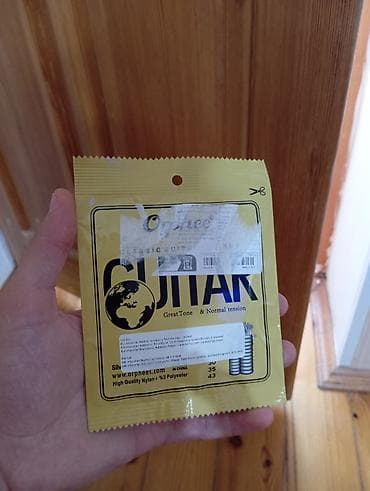 gitara tarnada: Neylon Simlər, Yeni — 1