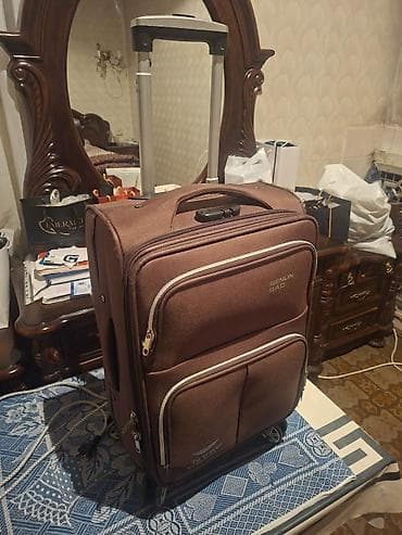 Şəkildə gördüyünüz qəhvəyi rəngdə çamadanı satıram. 20 kiloya qədər