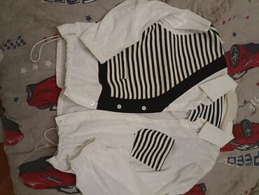 gence uşaq geyimleri instagram: - Rəng: ağ və qara - Dəst tərkibi: - Ağ köynək: klassik yaxalıq, ön — 2