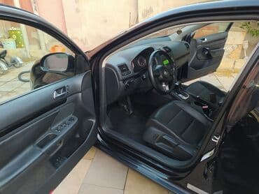 oturucu: Volkswagen Jetta: 2 l | 2009 il Sedan — 6