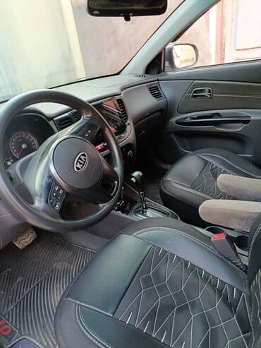 fiat doblo ölüxana: Kia Rio: 1.5 l | 2010 il Hetçbek — 2