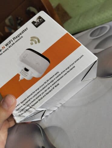mi wifi repeater: Wireless-N WiFi Repeater - Wi‑Fi şəbəkəsinin əhatə dairəsini artırmaq — 5
