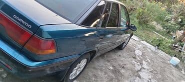 maşın al: Daewoo Espero sedan - Kuzov: sedan, tünd yaşıl rəng - Ön və arxa işıq — 10