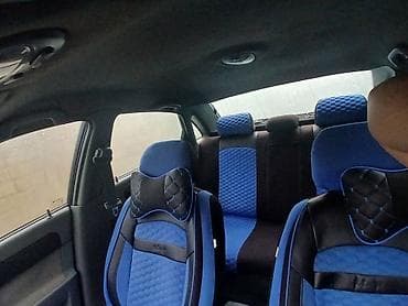 chevrolet gentra 2020: Qara rəngli Daewoo Gentra sedan avtomobili. Avtomobilin ön hissəsində — 6