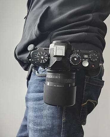 Kəmərə taxılan fotoaparat tutacağı – sürətli çıxarışlı klip sistemi •